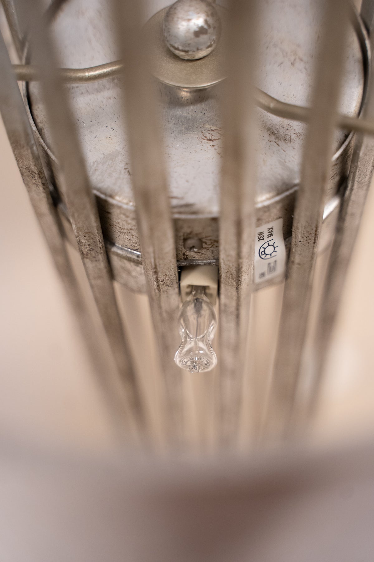Pair of Porta Romana Flynn Caged Lamps in Decayed Silver, supplied with original cylinder shades. Used condition with minor shade creasing and surface scratches.