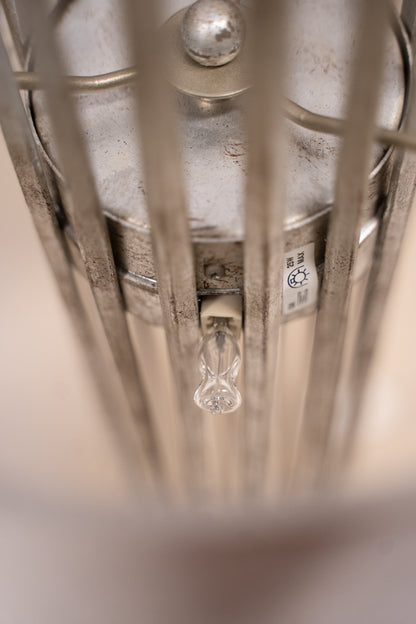 Pair of Porta Romana Flynn Caged Lamps in Decayed Silver, supplied with original cylinder shades. Used condition with minor shade creasing and surface scratches.