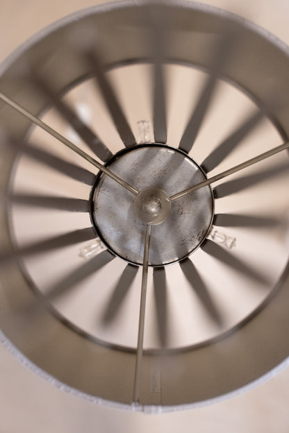 Pair of Porta Romana Flynn Caged Lamps in Decayed Silver, supplied with original cylinder shades. Used condition with minor shade creasing and surface scratches.