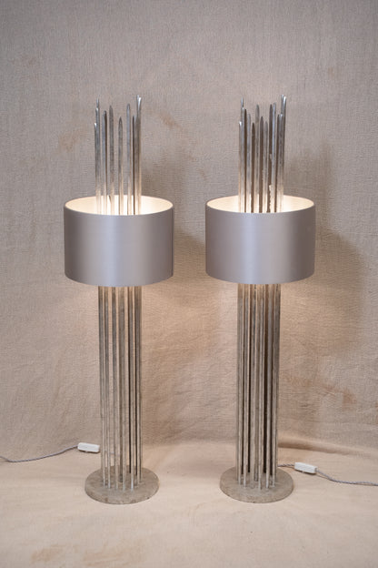Pair of Porta Romana Flynn Caged Lamps in Decayed Silver, supplied with original cylinder shades. Used condition with minor shade creasing and surface scratches.