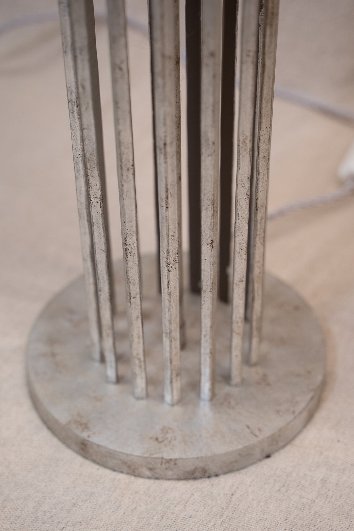Pair of Porta Romana Flynn Caged Lamps in Decayed Silver, supplied with original cylinder shades. Used condition with minor shade creasing and surface scratches.