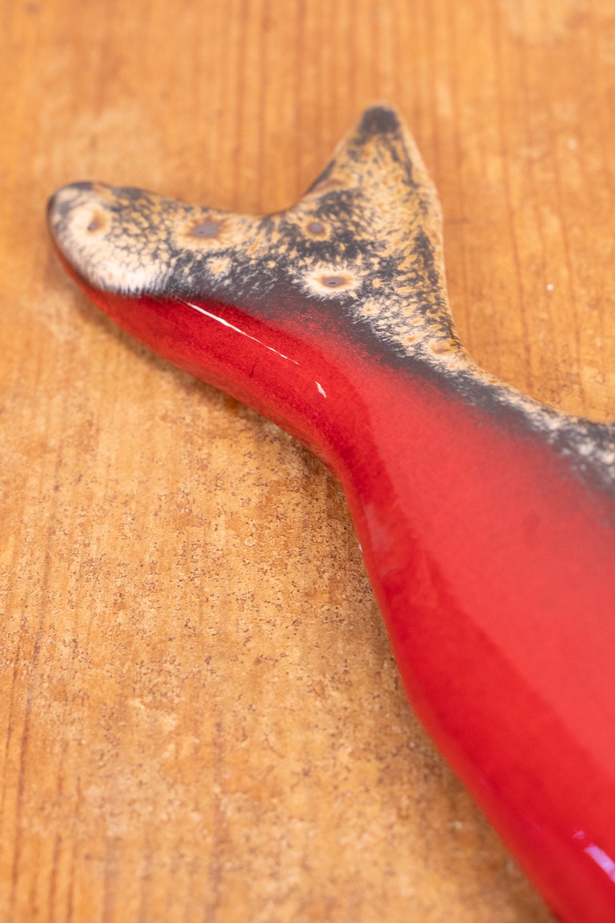 Hand-painted Portuguese ceramic sea bass wall decoration with unique surface details created using oxides and underglazes. Ideal for coastal interiors.