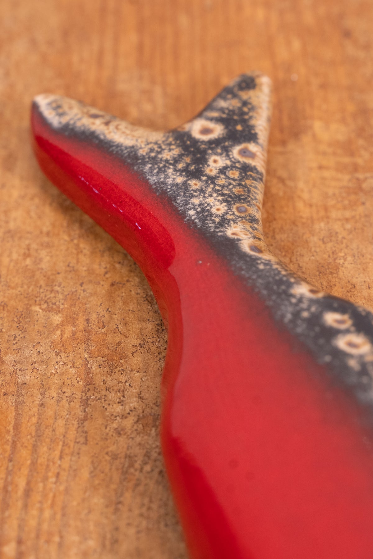 Hand-painted Portuguese ceramic sea bass wall decoration with unique surface details created using oxides and underglazes. Ideal for coastal interiors.