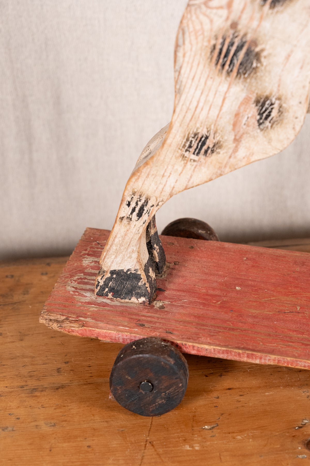 Vintage scratch-built wooden pull-along horse, possibly of French origin. A characterful folk-art toy for collectors or decorative display.