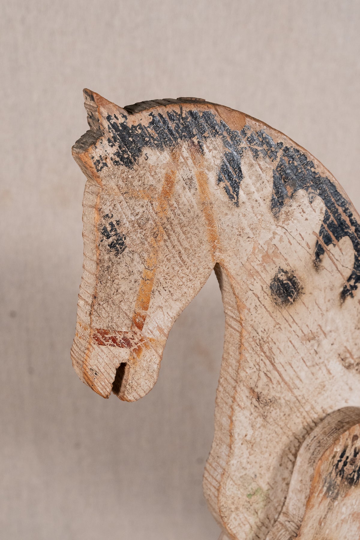 Vintage scratch-built wooden pull-along horse, possibly of French origin. A characterful folk-art toy for collectors or decorative display.