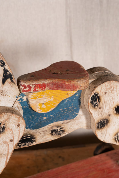 Vintage scratch-built wooden pull-along horse, possibly of French origin. A characterful folk-art toy for collectors or decorative display.