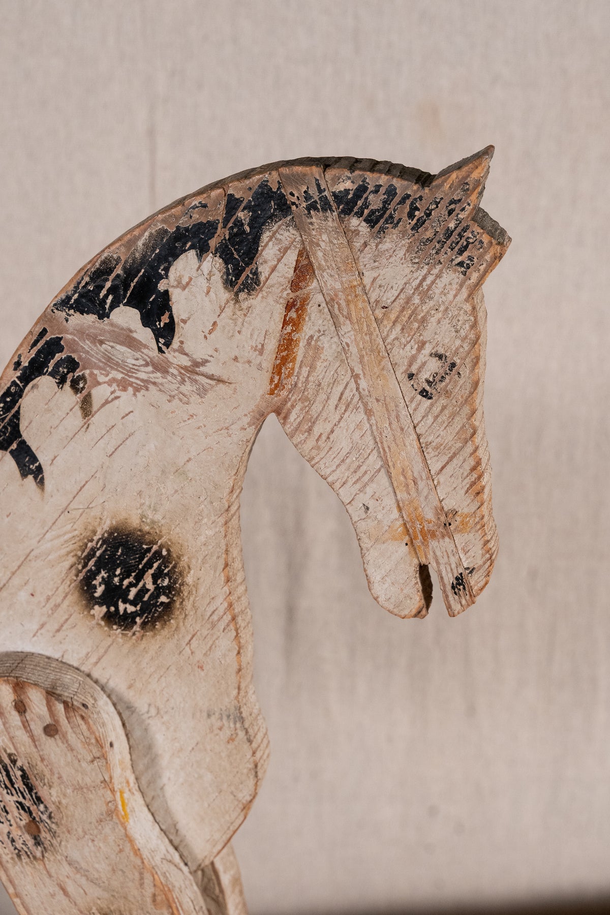 Vintage scratch-built wooden pull-along horse, possibly of French origin. A characterful folk-art toy for collectors or decorative display.