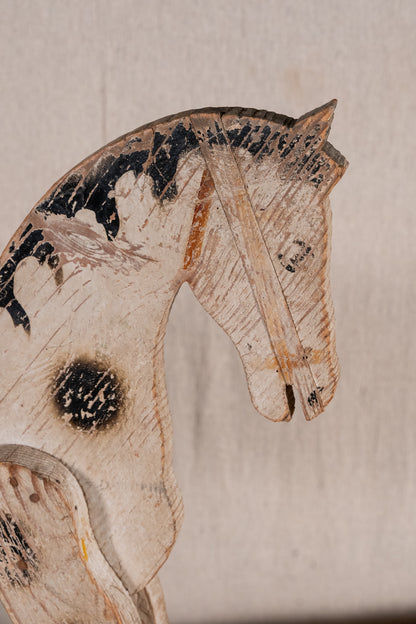 Vintage scratch-built wooden pull-along horse, possibly of French origin. A characterful folk-art toy for collectors or decorative display.