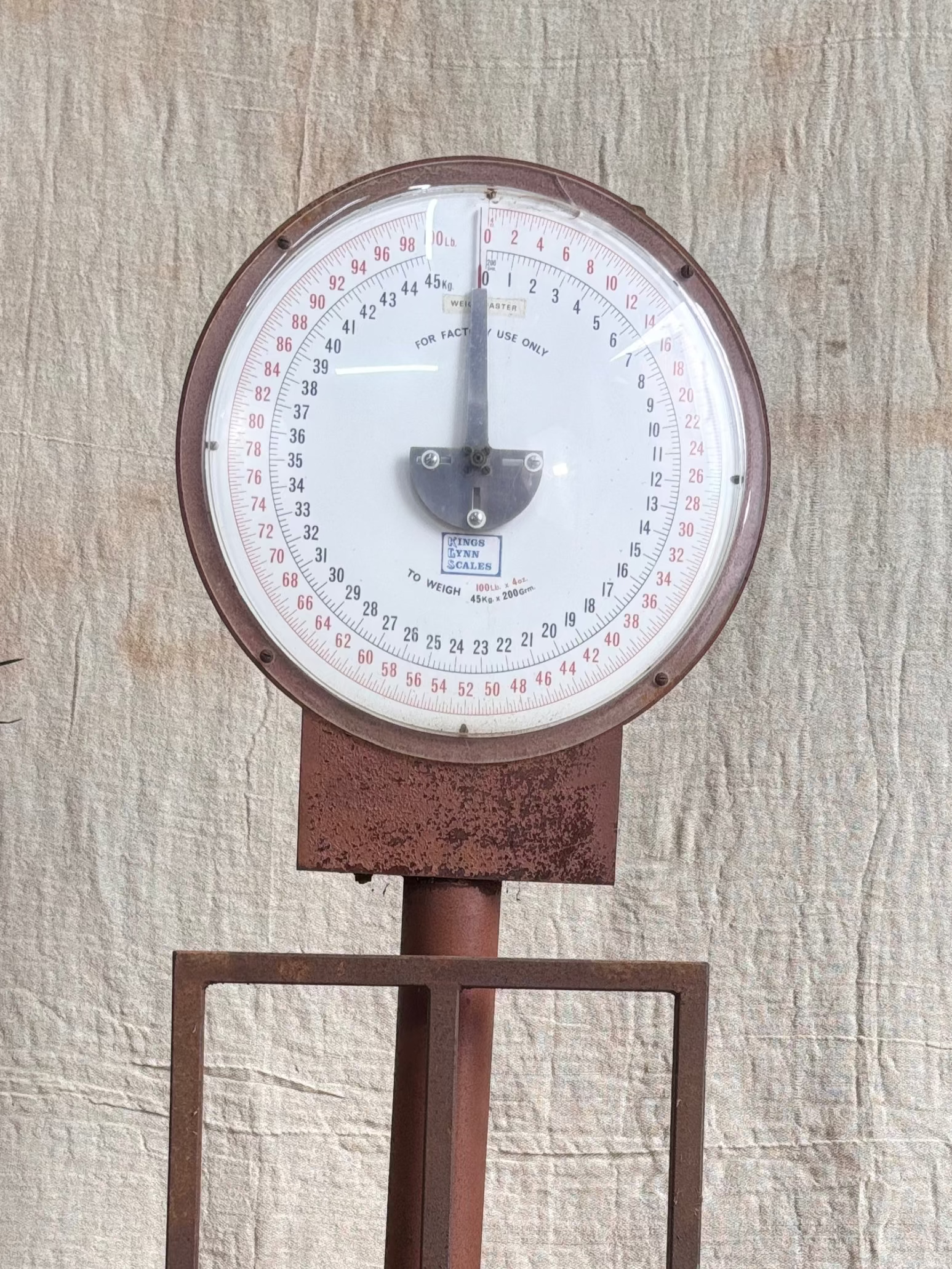 Vintage scale on a textured fabric background