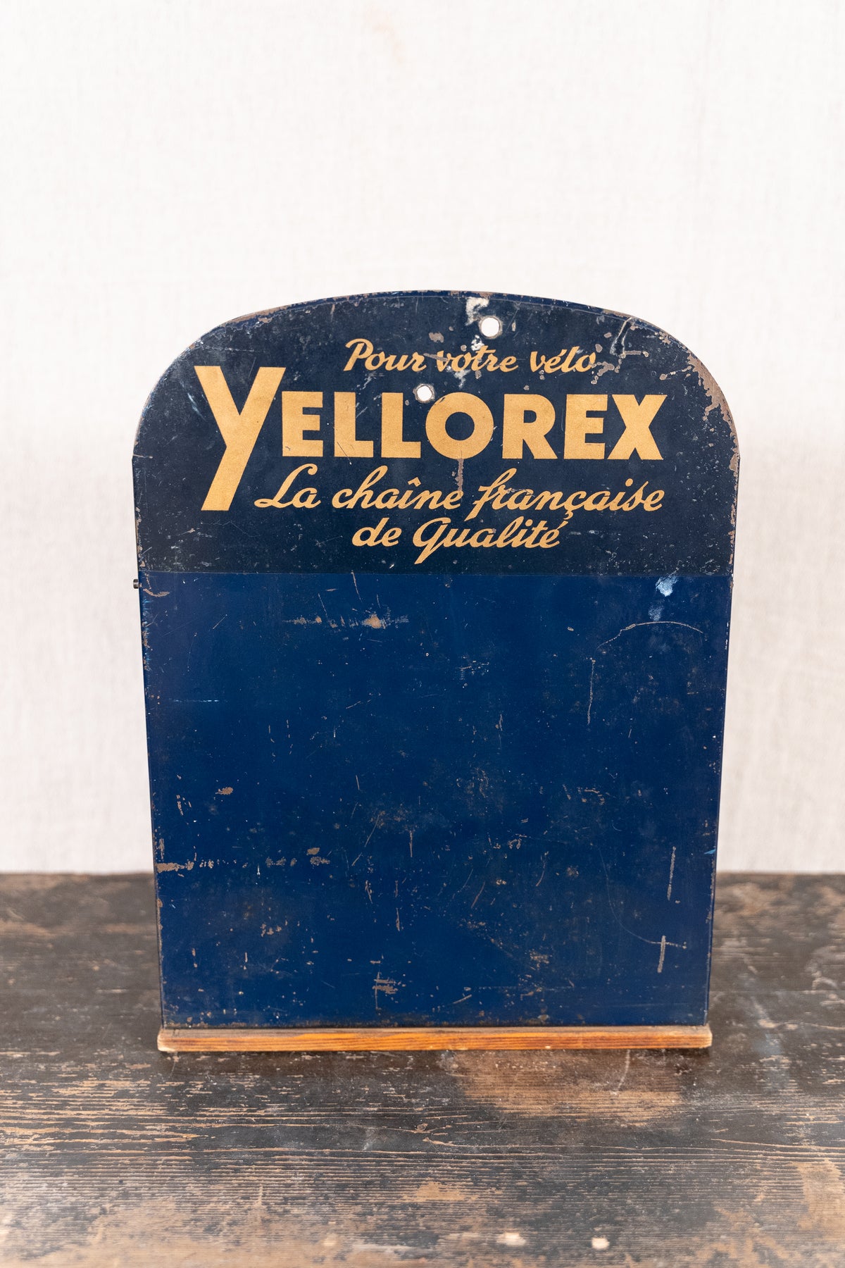 Vintage French metal chain display cabinet by Sedis, with original Yellorex bicycle and Yellow motorcycle chain advertising, storage slots and central drawer.