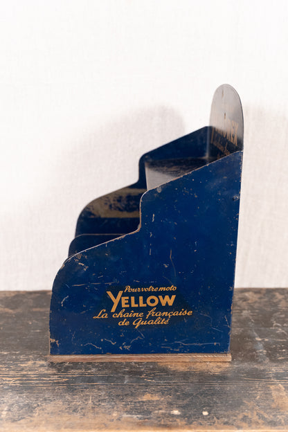 Vintage French metal chain display cabinet by Sedis, with original Yellorex bicycle and Yellow motorcycle chain advertising, storage slots and central drawer.