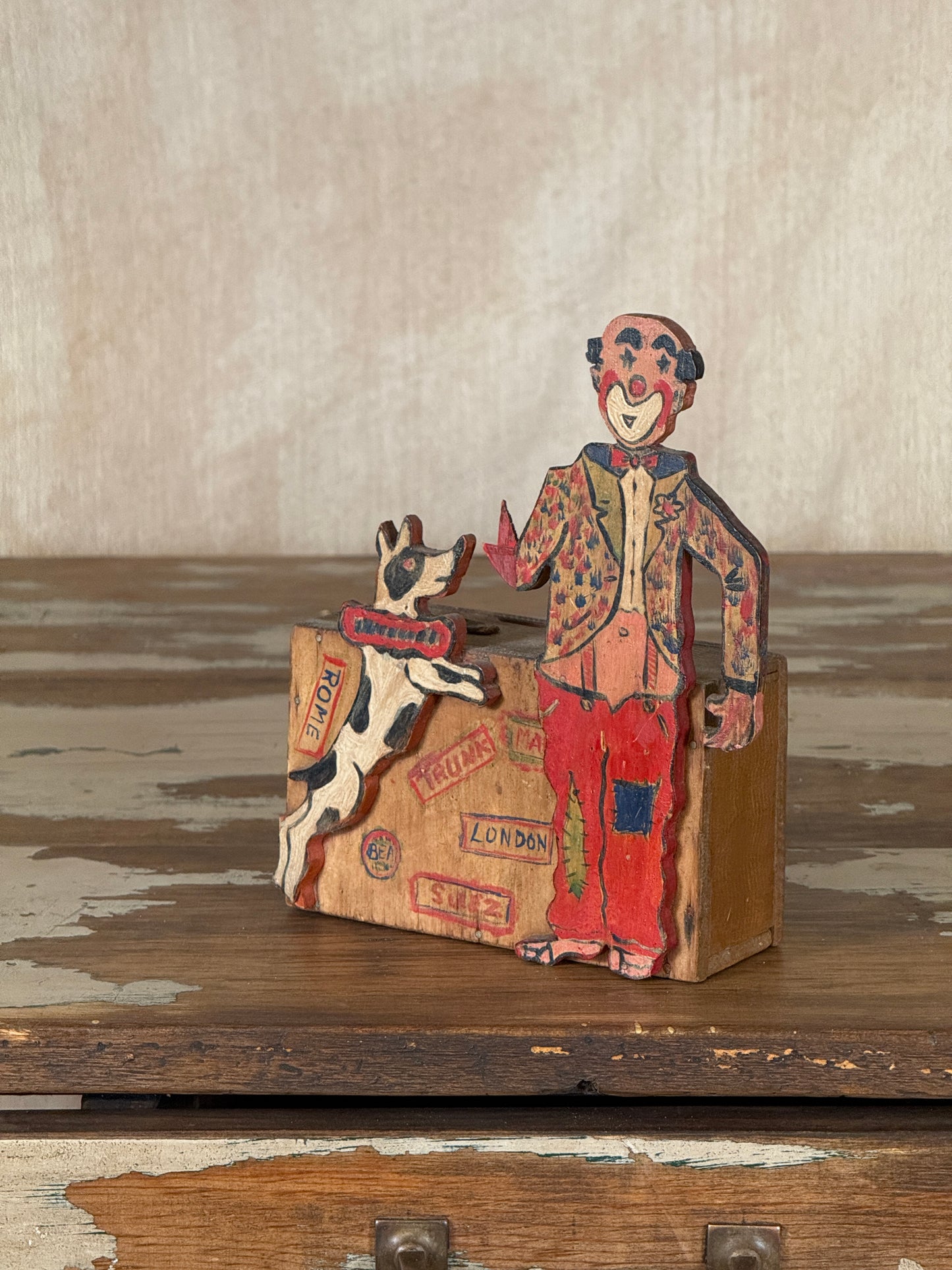 Hand-crafted folk art wooden clown money box