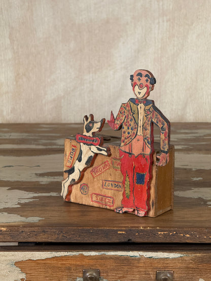 Hand-crafted folk art wooden clown money box