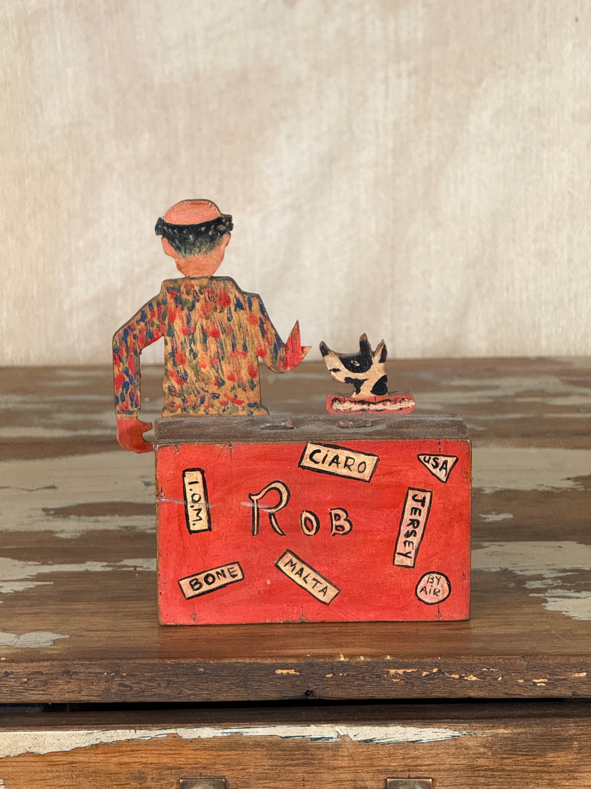 Hand-crafted folk art wooden clown money box