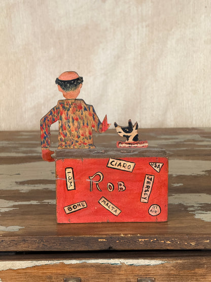 Hand-crafted folk art wooden clown money box