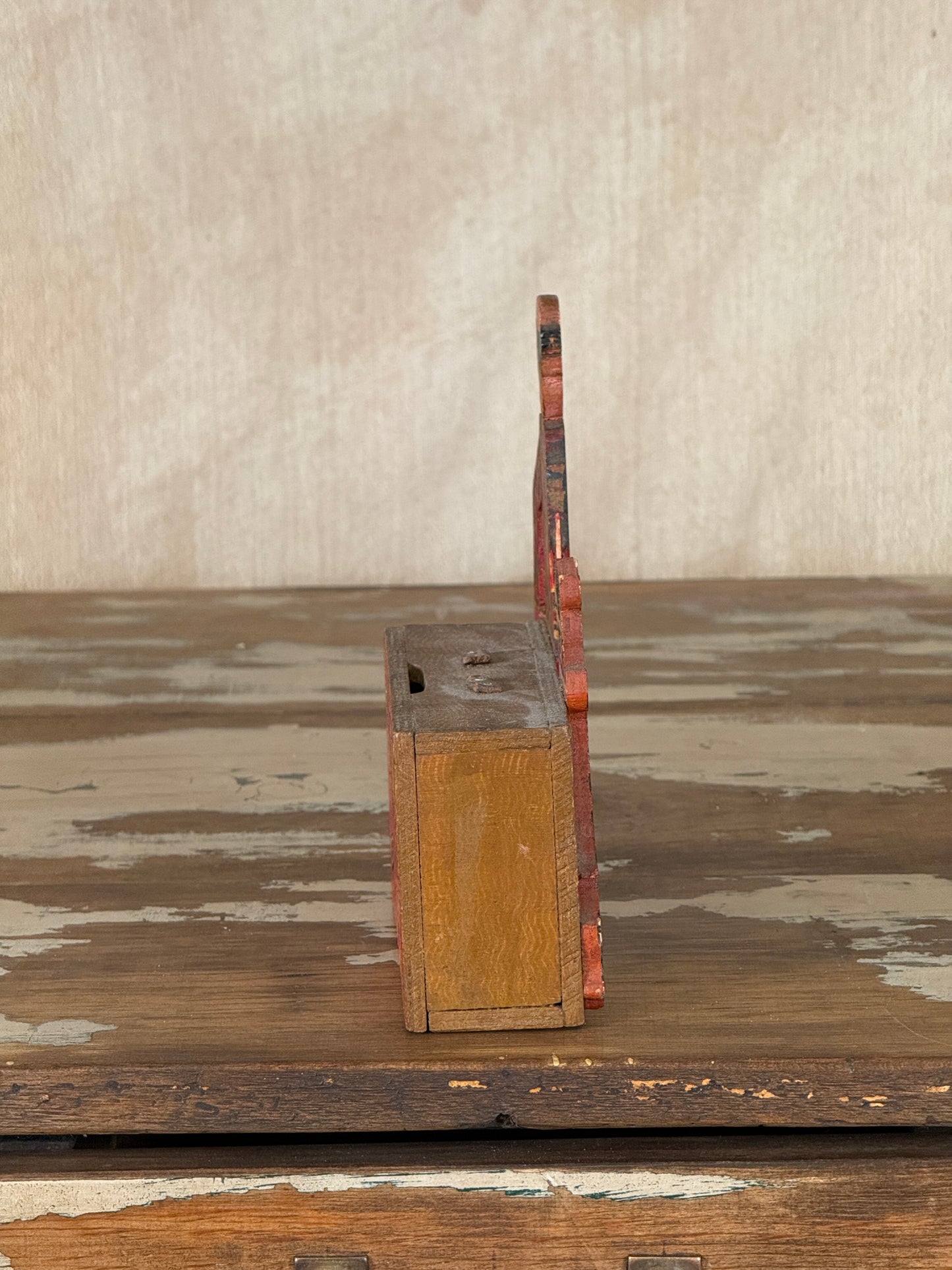Hand-crafted folk art wooden clown money box