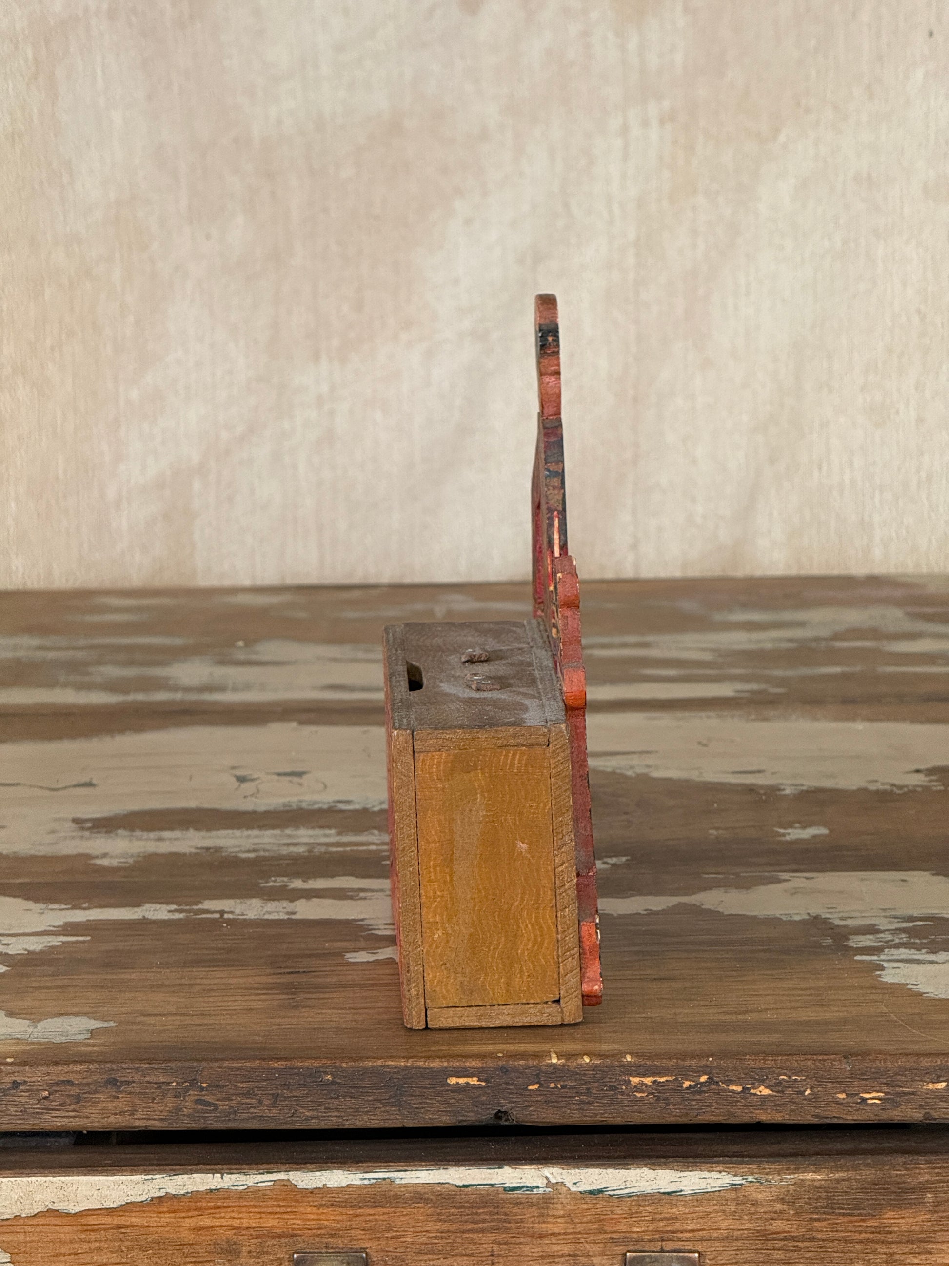 Hand-crafted folk art wooden clown money box