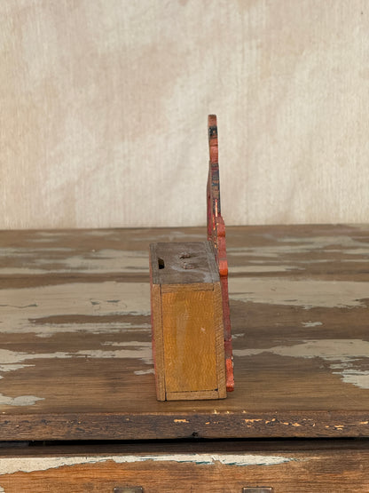 Hand-crafted folk art wooden clown money box