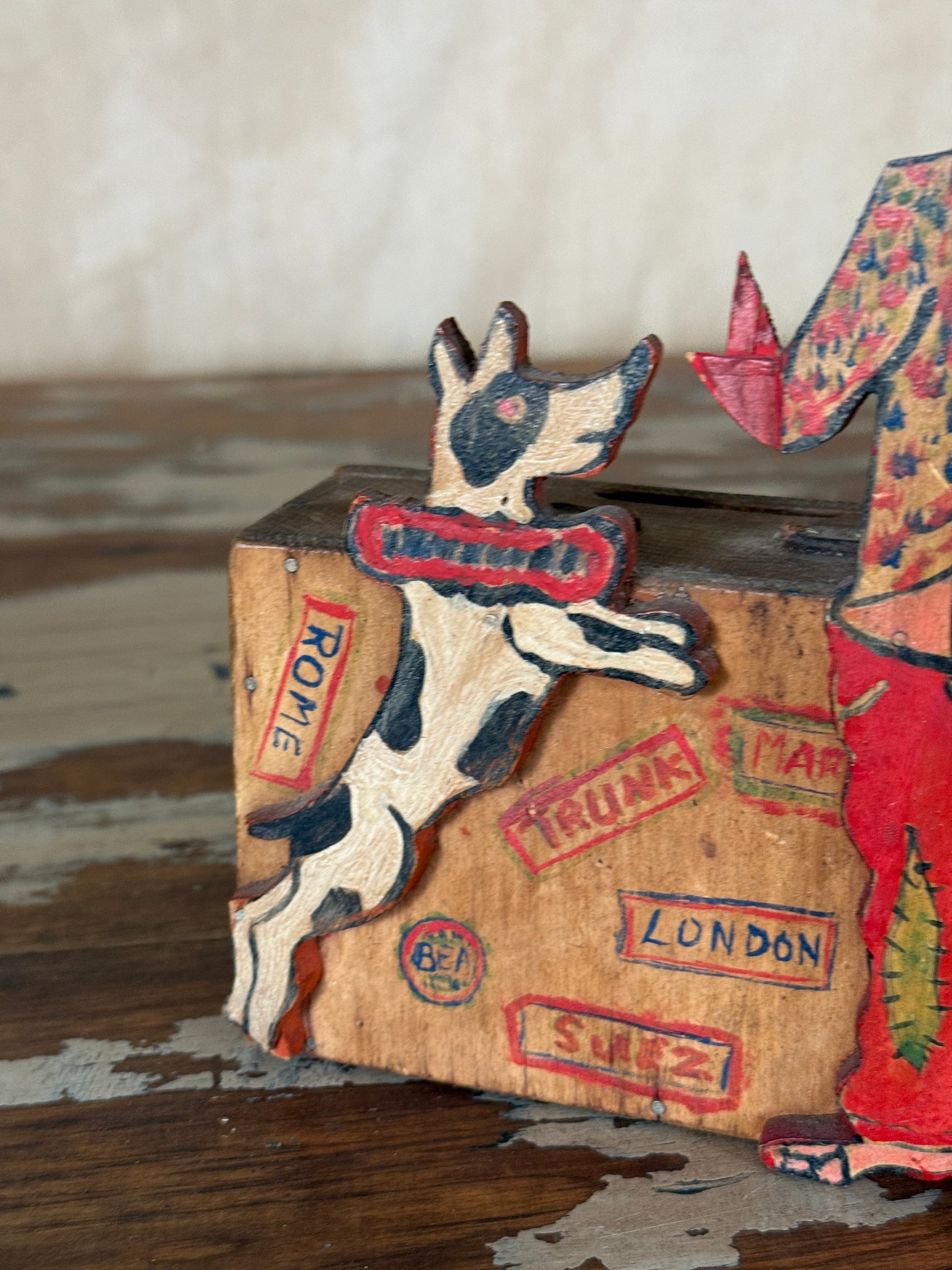 Hand-crafted folk art wooden clown money box