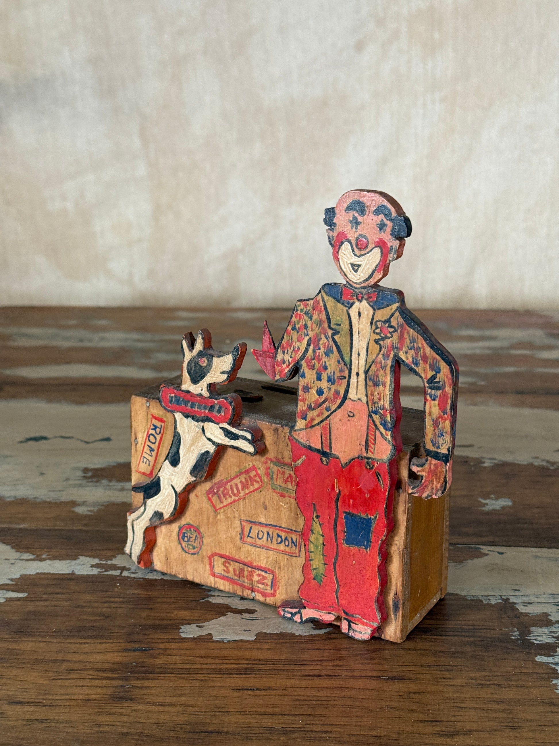 Hand-crafted folk art wooden clown money box