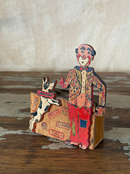 Hand-crafted folk art wooden clown money box