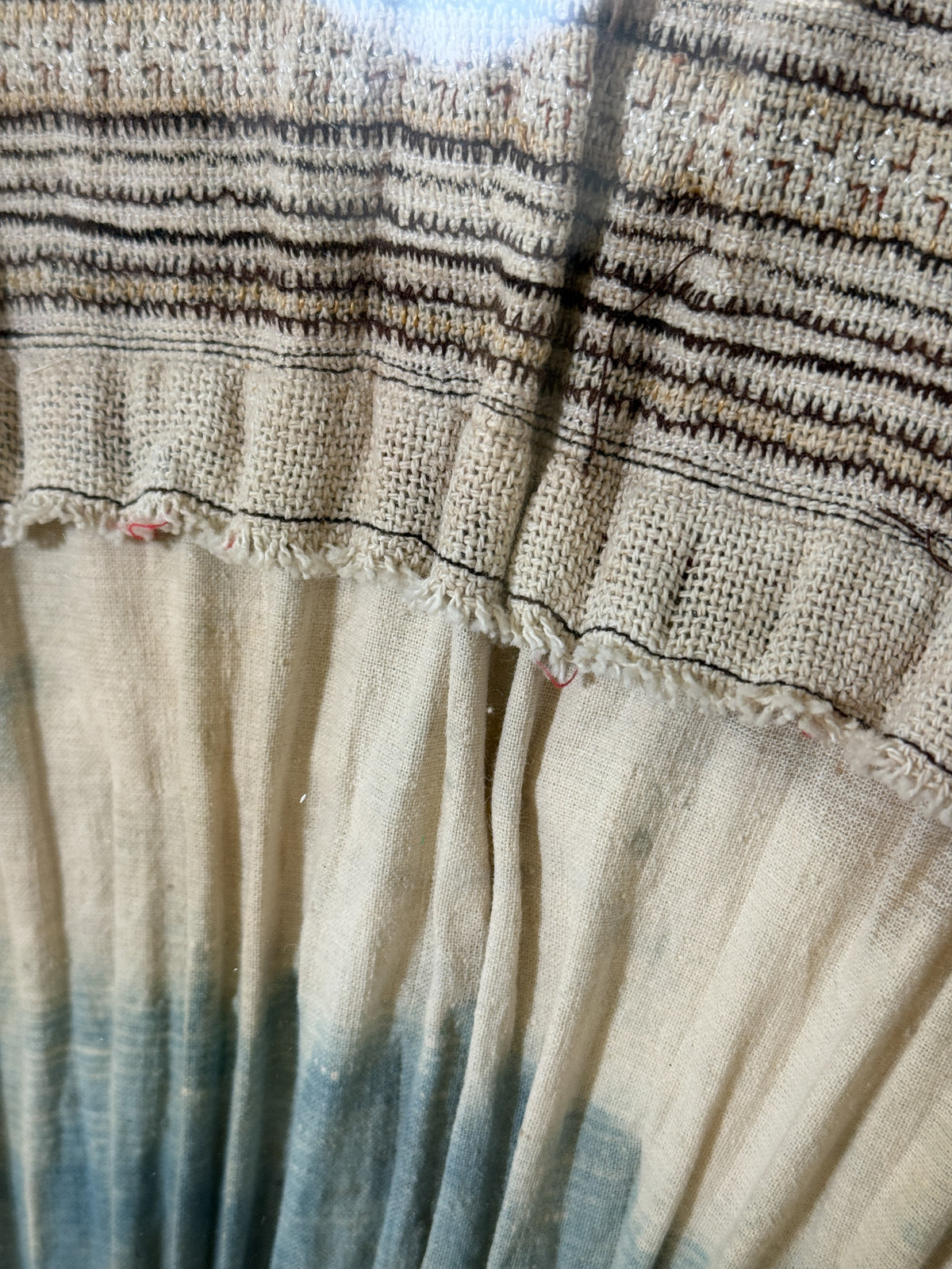 framed antique Miao tribal skirt