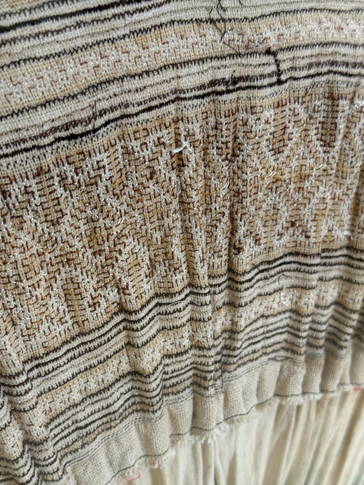 framed antique Miao tribal skirt