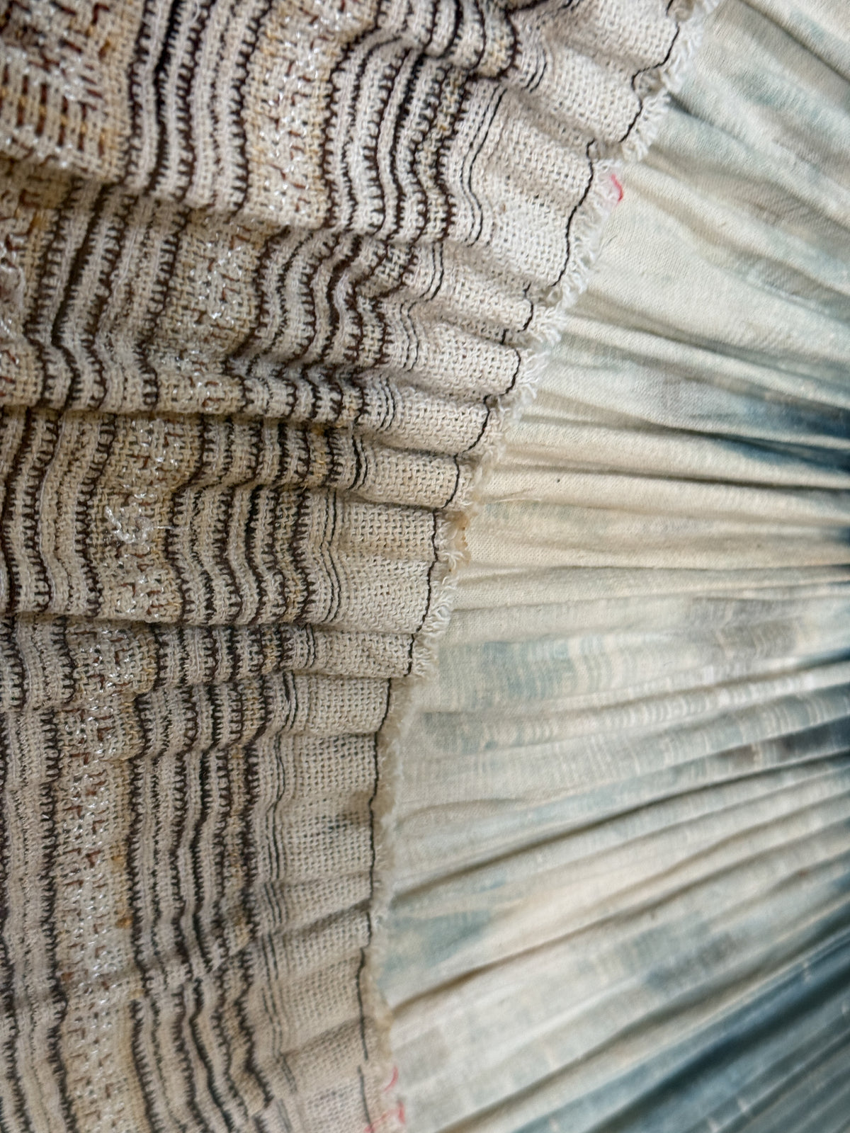 framed antique Miao tribal skirt