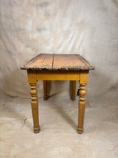 Wooden table with a checkered surface on a plain background