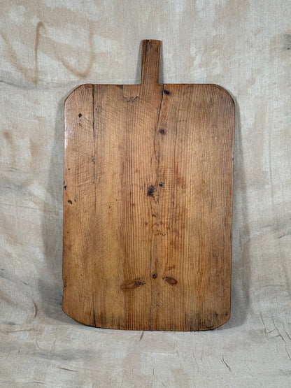 A huge antique wooden serving board. 