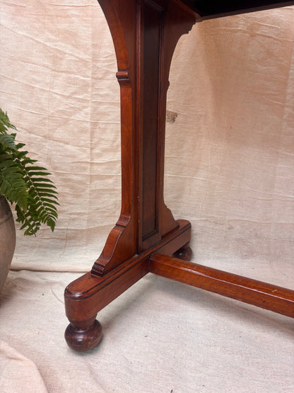 Wooden Table Leg with a plant on a cream background